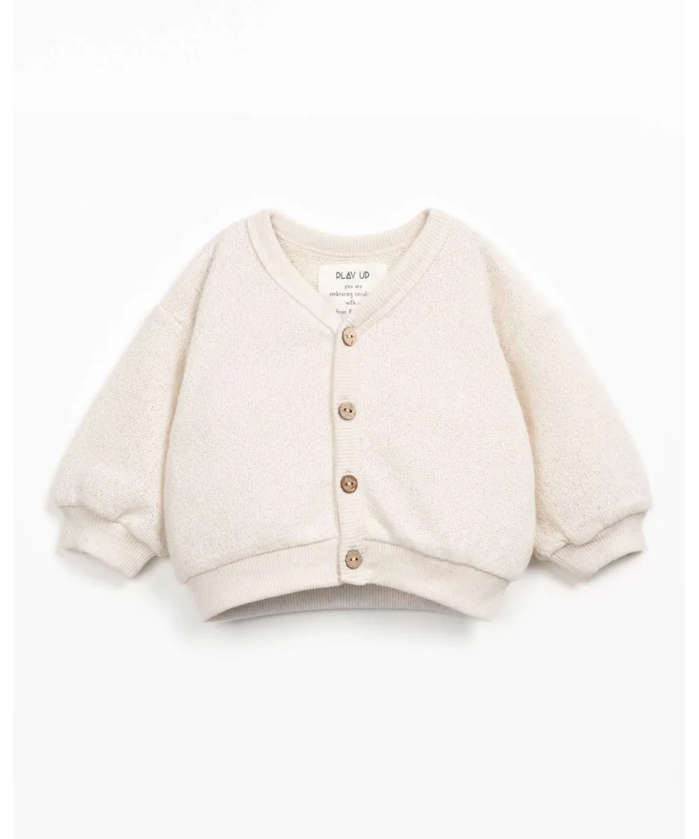 Play Up • Strickjacke mit Kokosnussknöpfen ecru